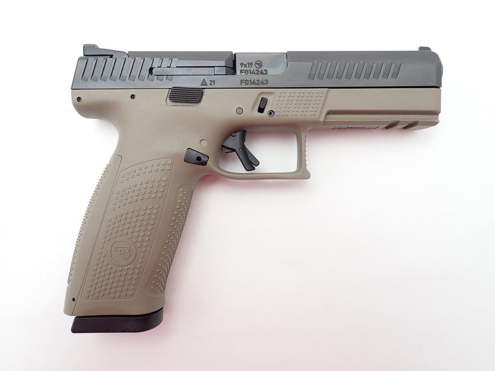 CZ P-10 F Pistol: SN: F014243 Cal: 9mm Action Type: Semi Auto Barrel Length: 4.5" Sights/Optics: Factory open sights Stock: Tan polymer frame Finish: Black blued steel slide and barrel Finish Cond: Original Bore: Very