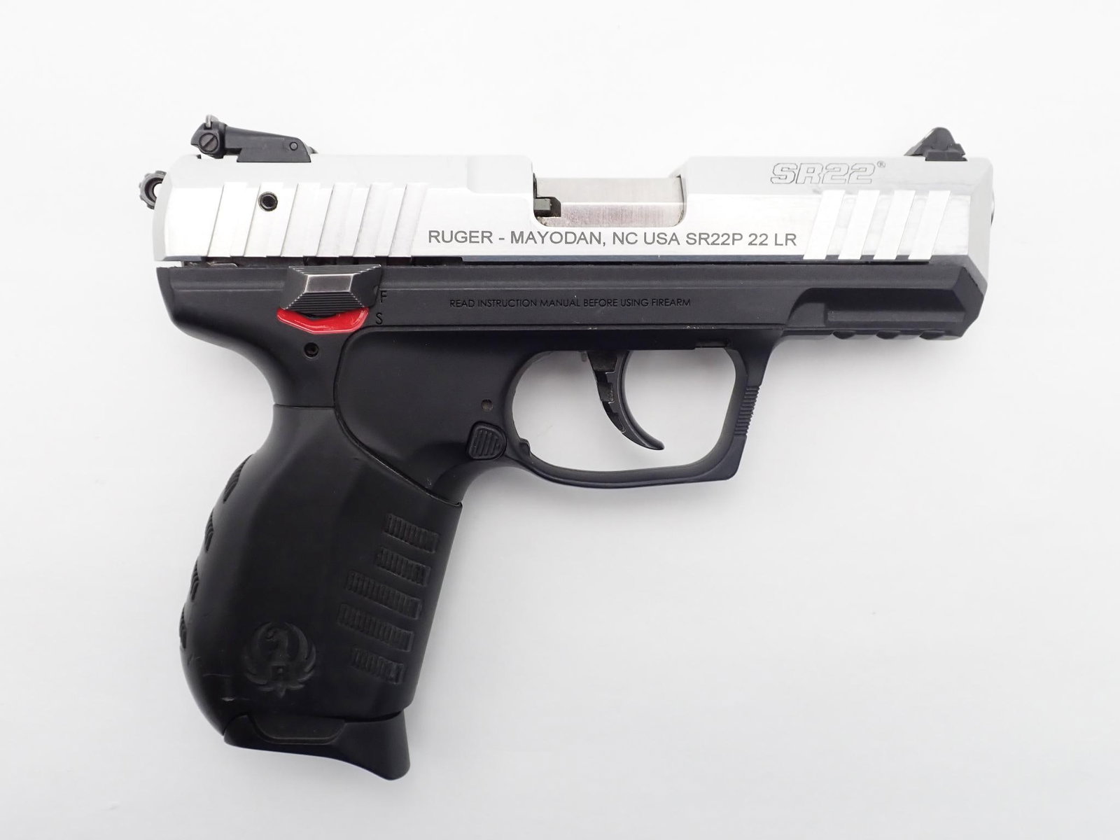 Ruger SR22 Pistol: SN: 369-68219 Cal: .22 LR Action Type: Semi Auto Barrel Length: 3.5" Sights/Optics: Factory open sights Stock: Black Polymer Frame Finish: Stainless slide and barrel Finish Cond: Original Bore: Good