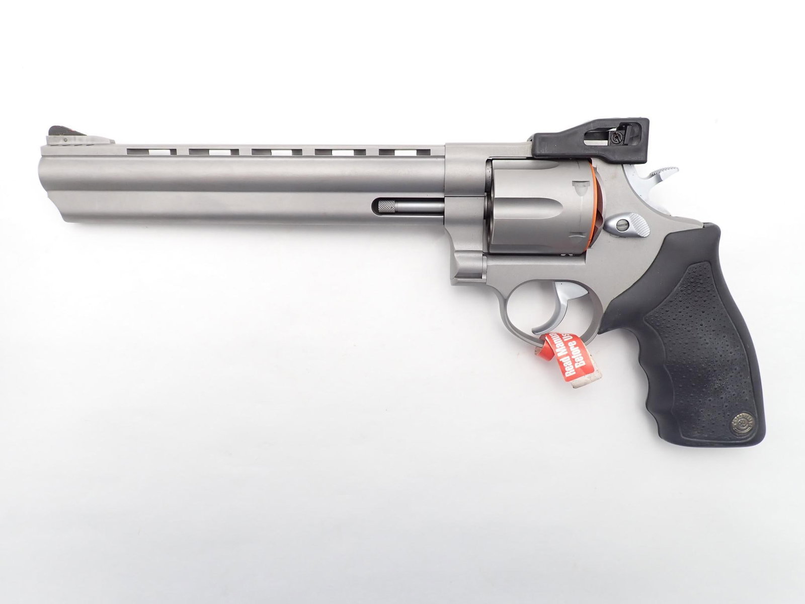Taurus 44 Revolver: SN: LM380122 Cal: .44 Mag Action Type: Double Action Barrel Length: 8 3/8" Sights/Optics: Adjustable factory sights Stock: Factory rubber grips Finish: Stainless finish Finish Cond: Original Bore: