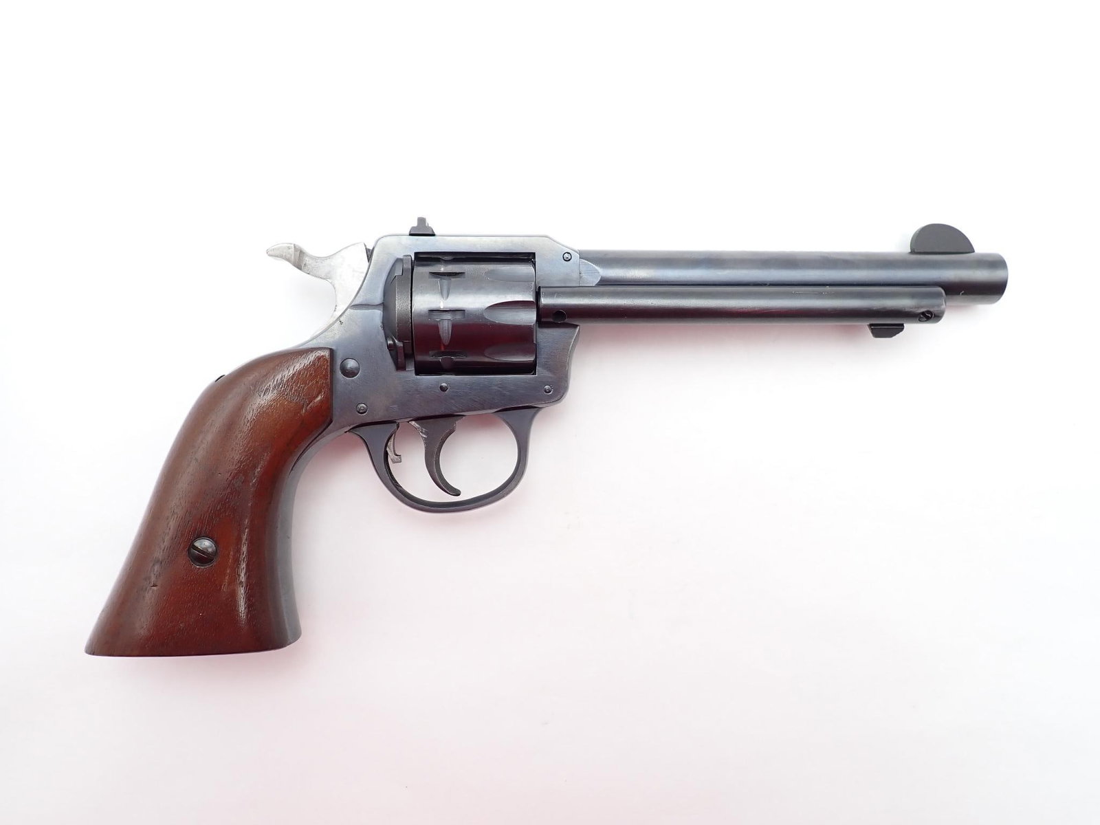 Harrington & Richardson 949 Forty Niner Revolver: SN: Z7116 Cal: .22 LR Action Type: Double Action Barrel Length: 5.5" Sights/Optics: Factory open sights Stock: Original wood grips Finish: Blued Finish Cond: Original Bore: Good Overall Cond: Very