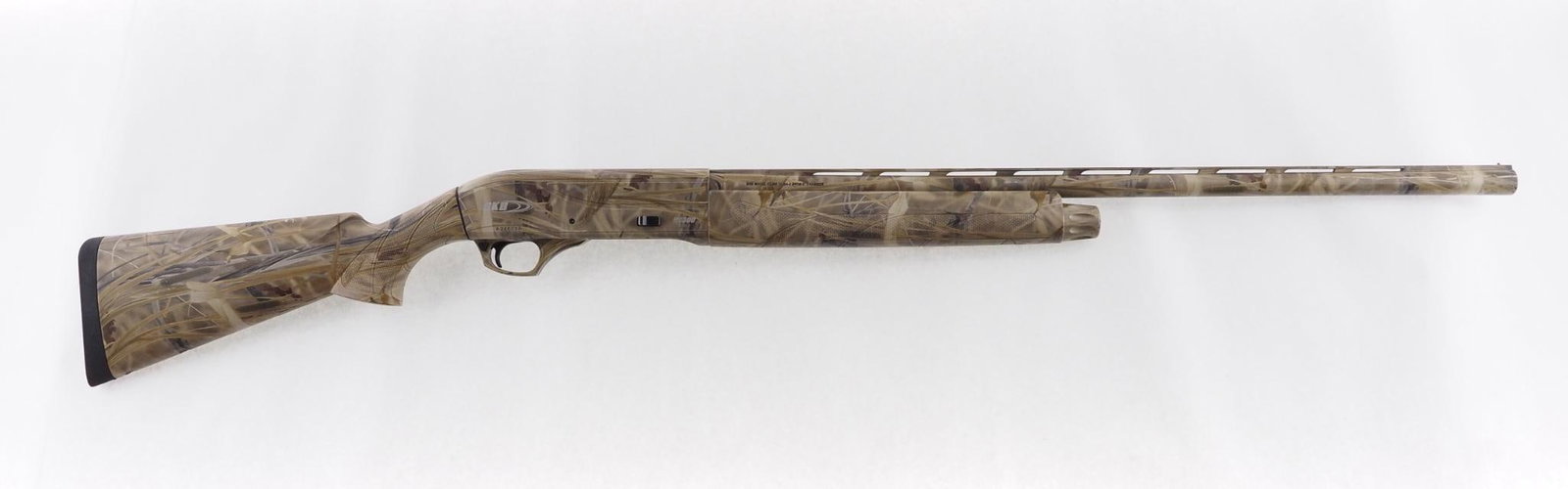 SKB Sports HS 300 Left Handed Shotgun: SN: A24603A Cal: 12 Ga. Action Type: Semi-Auto Barrel Length: 28" vent rib barrel with screw in choke tubes Sights/Optics: Bead Stock: Full camo composite stock Finish: Camo Fin