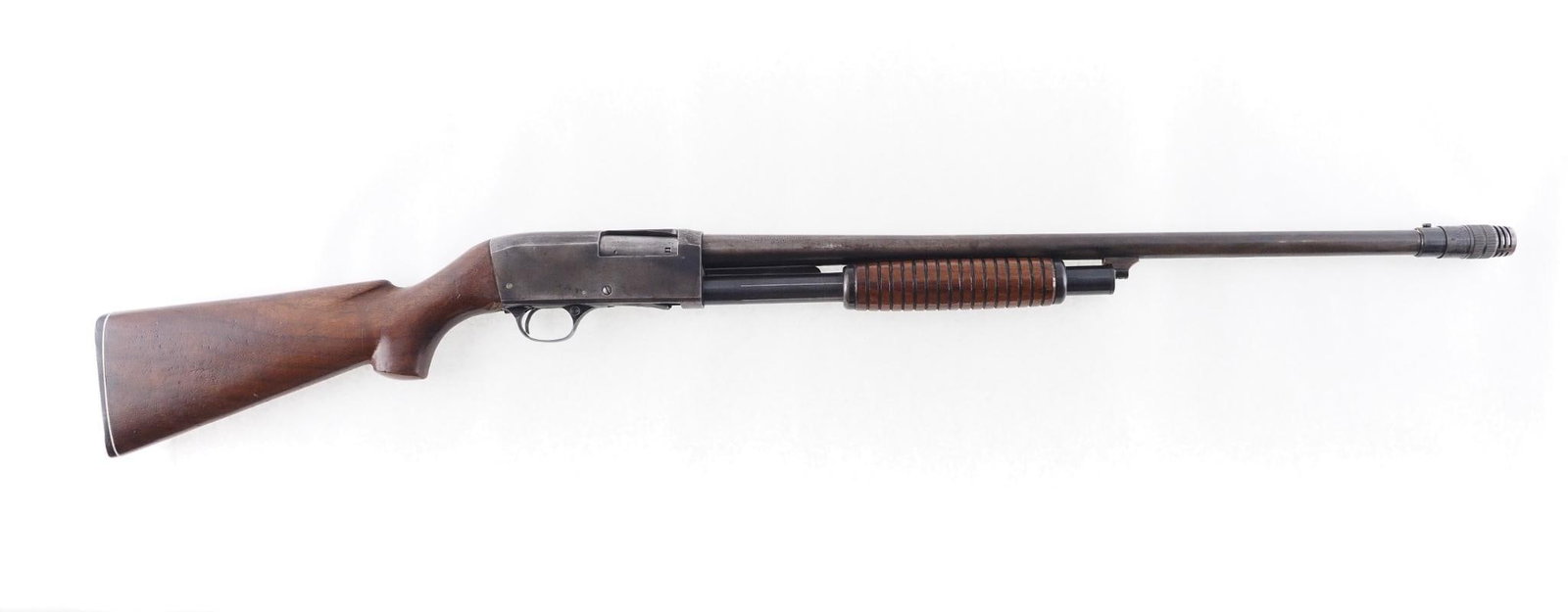 Stevens 820 B Shotgun: SN: None Cal: 12 Ga. Action Type: Slide Action Barrel Length: 26" Sights/Optics: Bead Stock: Wood with a couple of chips where buttstock meets receiver Finish: Blued showing extensive wear Finish
