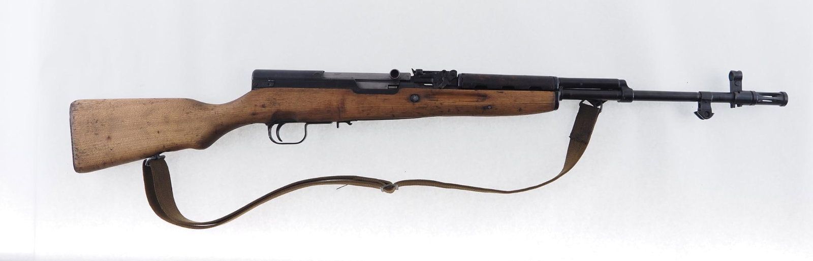 Norinco SKS Rifle: SN: 14097791 Cal: 7.62 x 39 Action Type: Semi Auto Markings: Receiver marked "SKS 7.62X39 Made in China by Norinco, KSI Pomona CA" Barrel Length: 20" Sights/Optics: Factory open sights Stock: