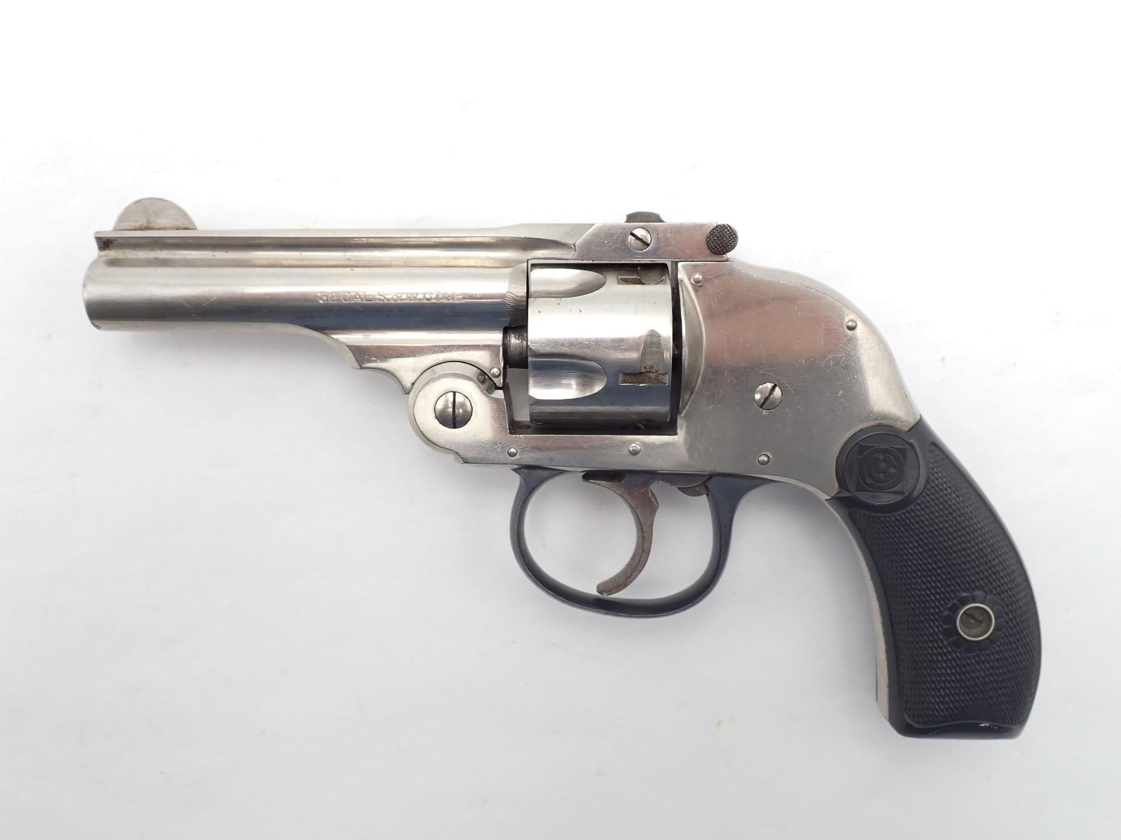 Harrington and Richardson Auto Eject Revolver: SN: 153691 Cal: .32 S&W Action Type: Double Action Barrel Length: 3" Sights/Optics: Original Sights Stock: Black plastic factory grips Finish: Nickel Finish Cond: Original Bore: Very Good Overall