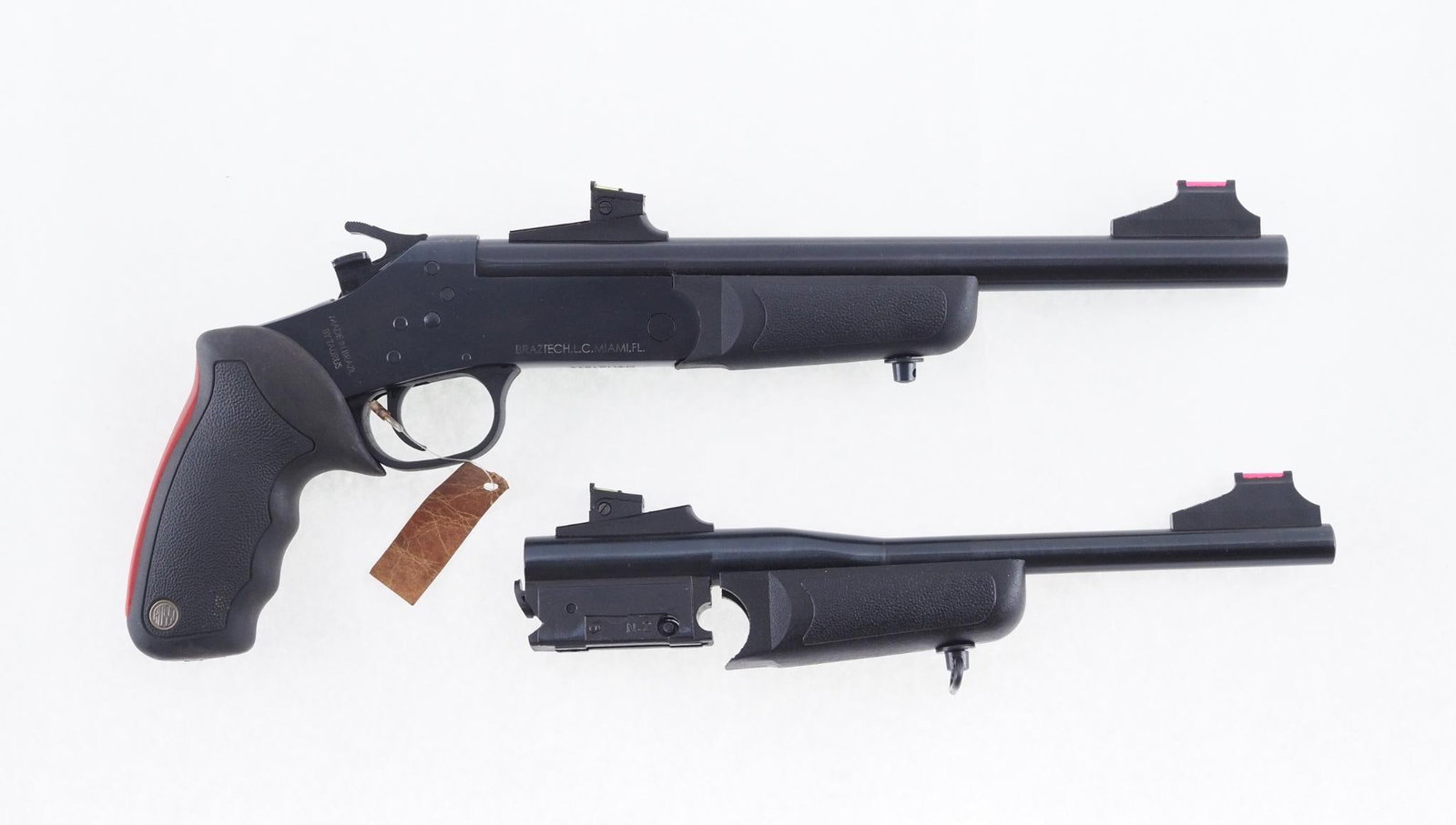 Taurus P4102211 Pistol: SN: 5HR161314 Cal: .45 LC / 410 Action Type: Single Shot Barrel Length: 11" Sights/Optics: Factory fiber optic sights Stock: Rubber/Synthetic grip and forend Finish: Blued Finish Cond: Original Bore: