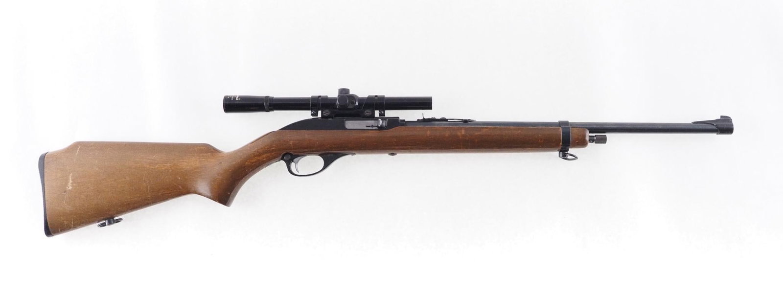 Marlin 75 Rifle: SN: 72243000 Year of Mfg: 1967-1975 Cal: .22 LR Action Type: Semi- Auto Barrel Length: 18" Sights/Optics: Original open sights with a Glenfield 4 X 15 Scope Stock: Wood with handling marks Finish: