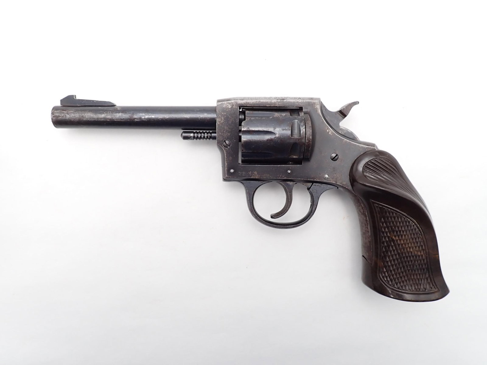 Iver Johnson Model 55A Revolver: SN: H30466 Cal: .22 Cal Action Type: Double Action Barrel Length: 4.5" Sights/Optics: Original sights Stock: Original plastic target style grips Finish: Blued Finish Cond: Worn in areas Bore: Very
