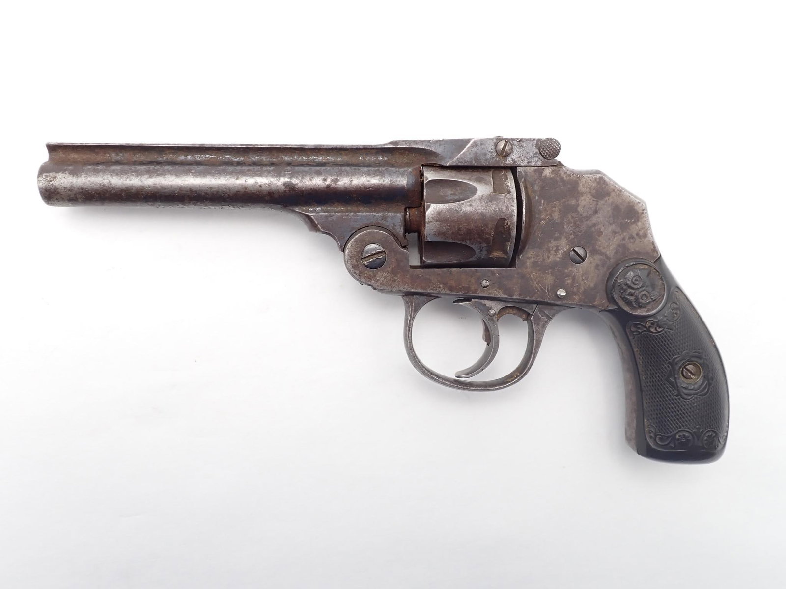 Iver Johnson 2nd Hammerless Revolver: SN: 56528 Cal: .32 Cal Action Type: Double Action Barrel Length: 4" Sights/Optics: Original rear, missing front Stock: Black Plastic Finish: Blued Finish Cond: Most of finish is missing Bore: Poor