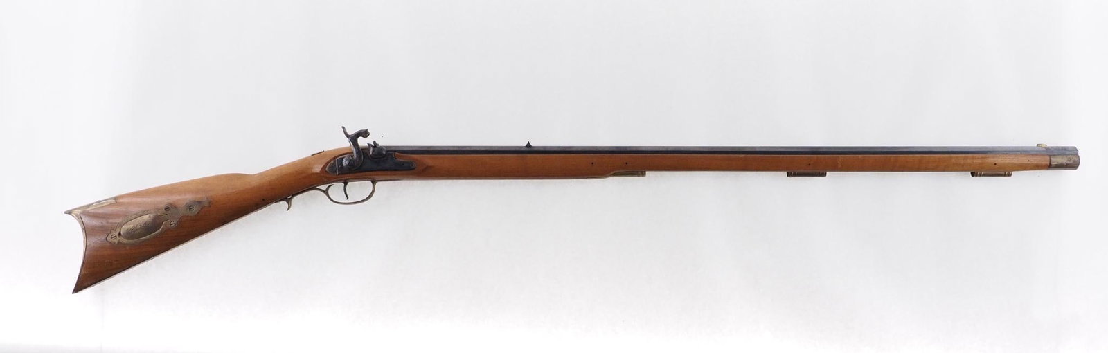 Italian Percussion Rifle: SN: 3246 Cal: .44 Cal Action Type: Percussion Barrel Length: 34.5" Sights/Optics: Original open sights Stock: Original wood stock Finish: Blued barrel, case color receiver plate Finish Cond: