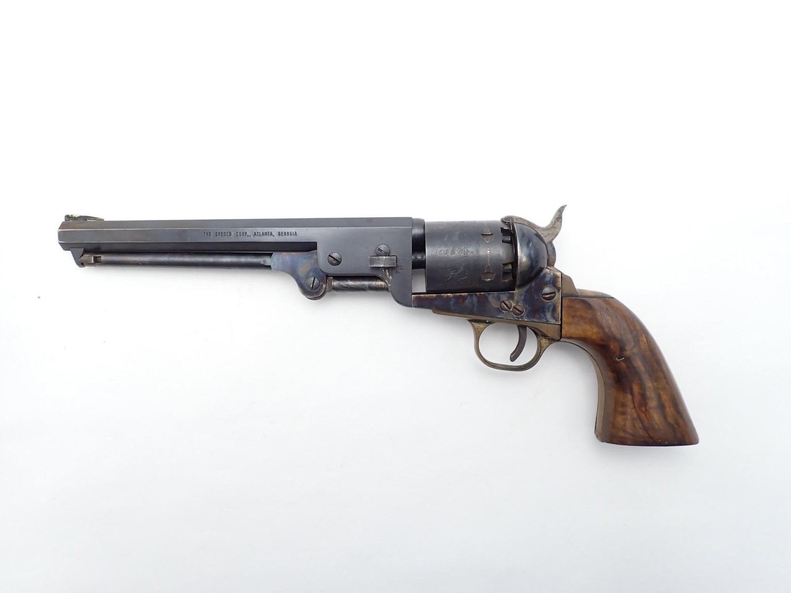 Spesco 1851 Navy Revolver: SN: 18140 Cal: .36 Cal Action Type: Percussion Barrel Length: 7.5" Sights/Optics: Factory Sights Stock: Original wood grips Finish: Blued barrel and hammer, case hardened frame, brass trigger guard