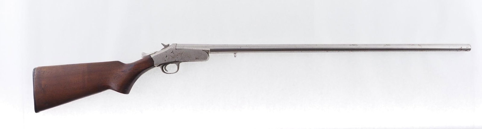 Harrington and Richardson Topper M48 Shotgun: SN: G1101 Year of Mfg: 1946 Cal: 16 Ga. Action Type: Single Shot Barrel Length: 30" Modified choke Stock: Missing forend, buttstock is chipped at wrist Finish: Nickel Finish Cond: Appears to have