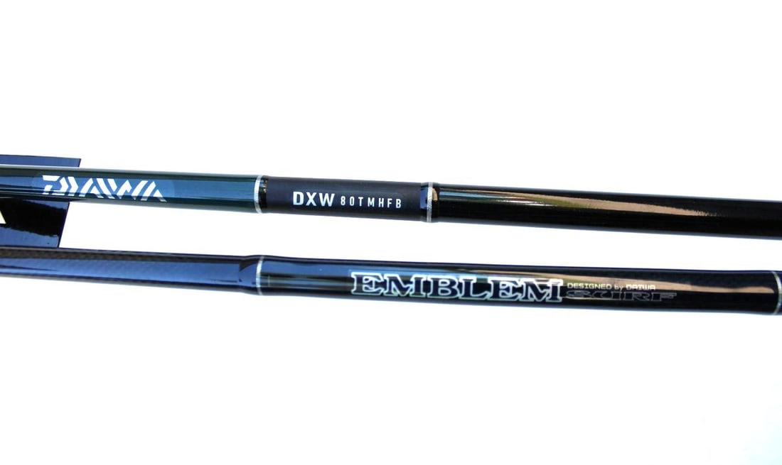 (2) Daiwa Rods: Emblem Surf EM-ES701MFS, and DXW80TMHFB8'