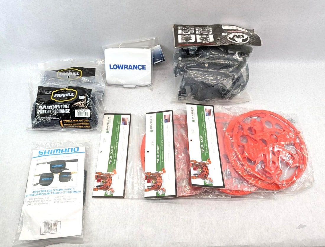 Ice Fishing Lot: including tip up lockers, Frabill replacement nets, etc