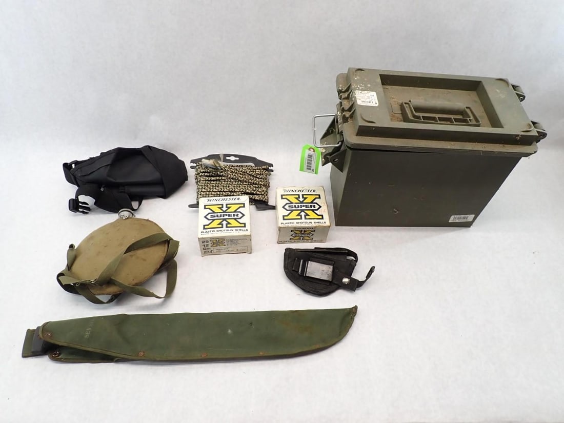 Sportsman's Lot: incl.: (2) boxes 12 Ga. shotgun shells (one box lacking a couple); poly ammo can; canteen; camo rope; small holster; machete; more
