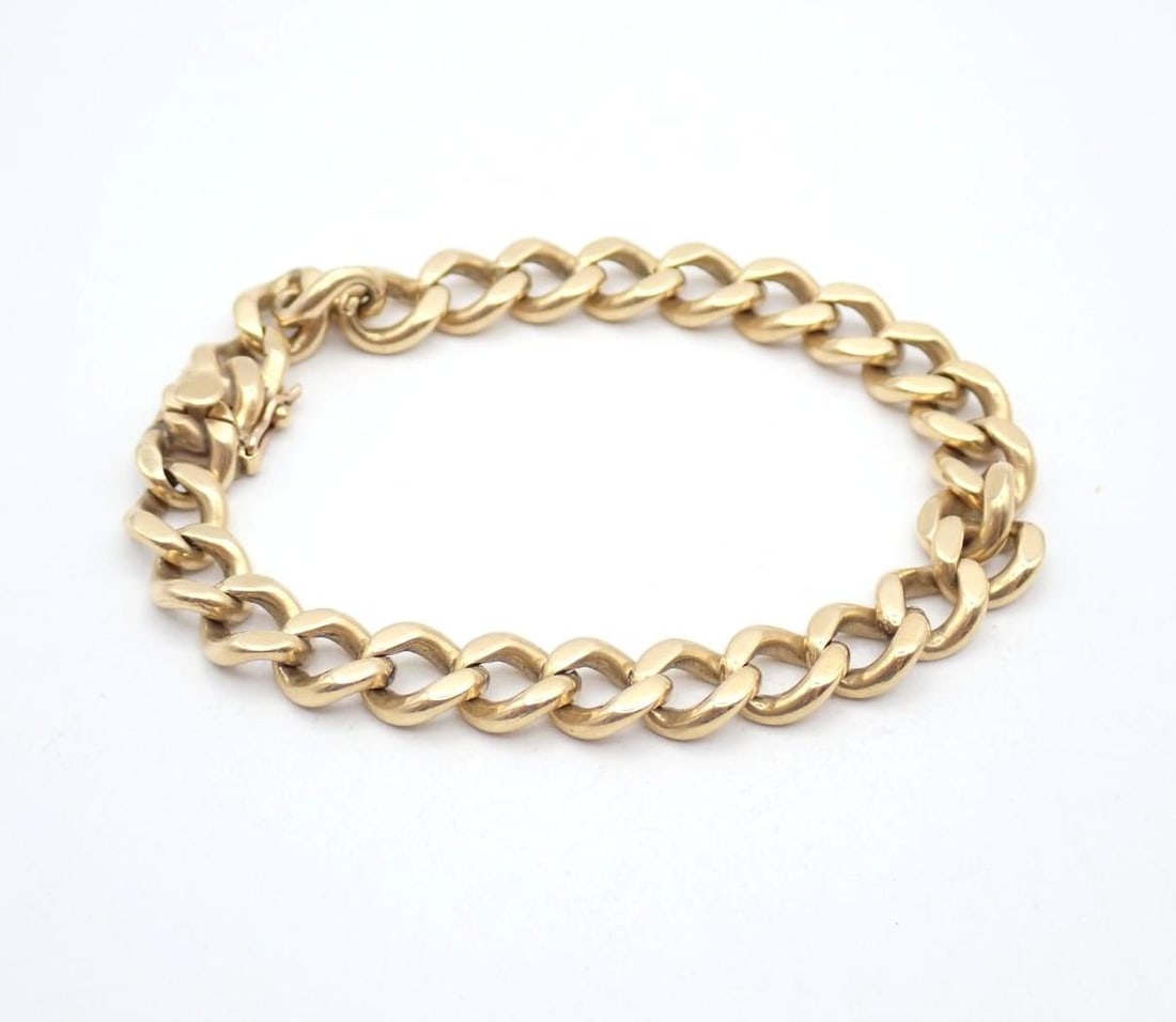 18K Yellow Gold Bracelet: 7.5" in length, 35.58 grams, acid tested