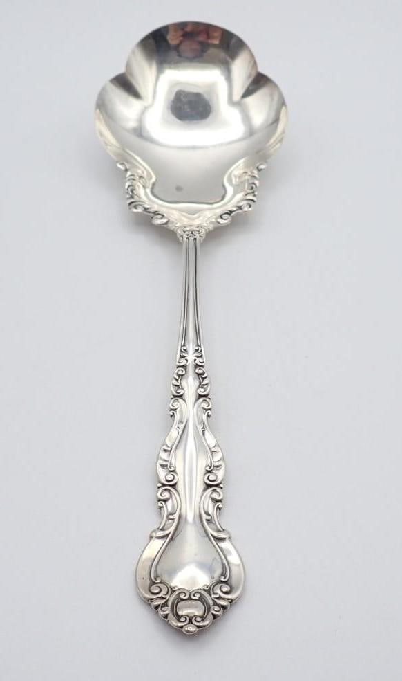 Sterling Silver Serving Spoon: 8.625" in length, 70 grams