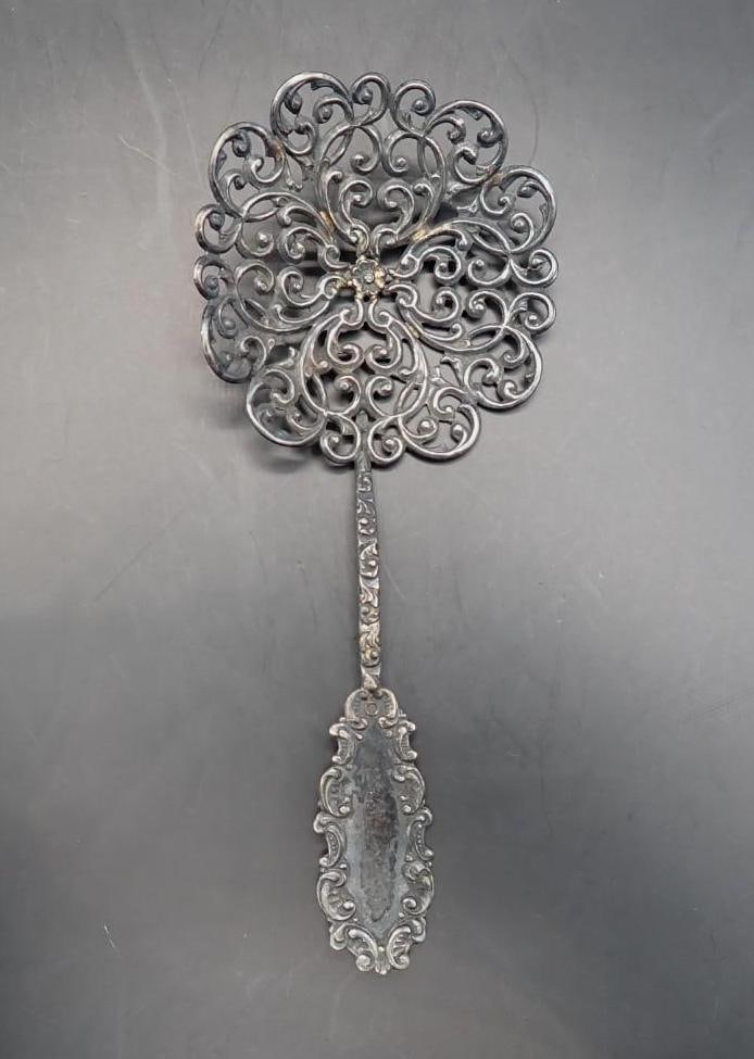Sterling Silver Pierced Bowl Spoon: 4.625" in length, 11.7 grams