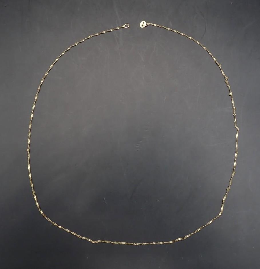 10K Yellow Gold Necklace: 18" in length, lacking the clasp, .62 grams