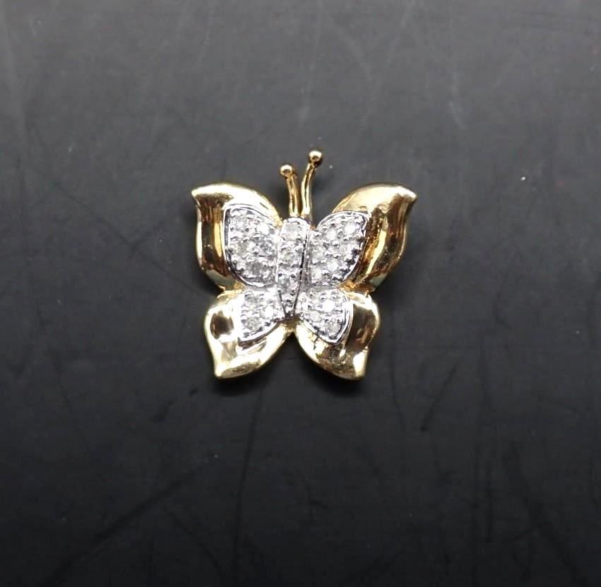 10K Yellow & White Gold and Diamond Butterfly Pendant: set with (21) 1.2mm+/- round cut diamonds, 14.6mm in width, 1.47 grams total weight