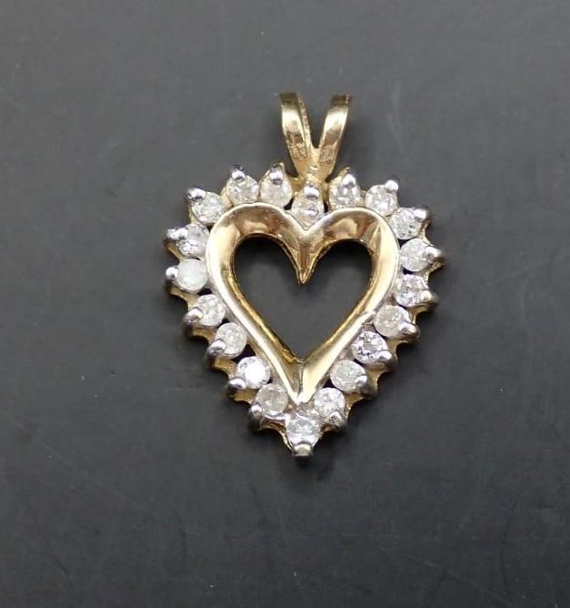 10K Yellow Gold and Diamond Heart Pendant: set with (20) 2mm+/- round cut diamonds, 16.5mm in width, 2.23 grams total weight
