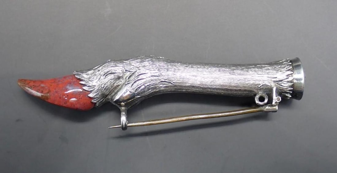 Silver Deer Leg Brooch: finely detailed with carved stone hoof; 76.5mm in length; un-signed; the cap monogrammed