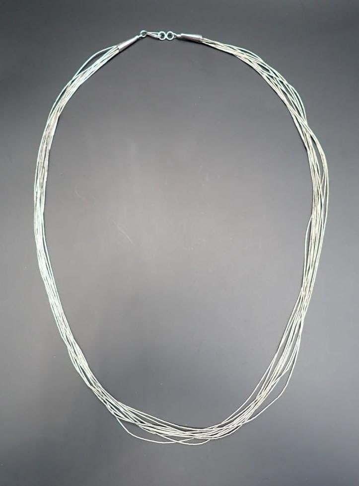 Liquid Sterling Silver Necklace: 24" in length; 12.9 grams