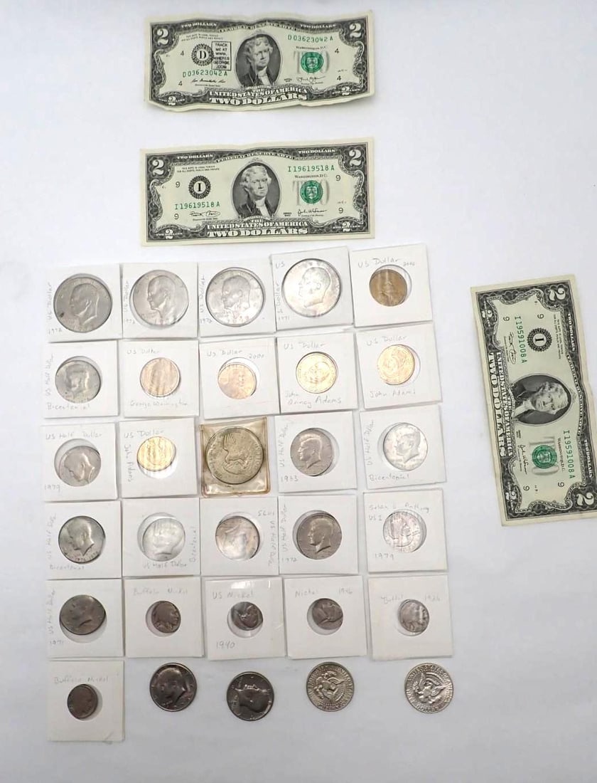U.S. Coin & Currency Lot: incl.: (3) silver clad Kennedy half dollars; (5) Eisenhower dollars; (9) Kennedy half dollars; more...