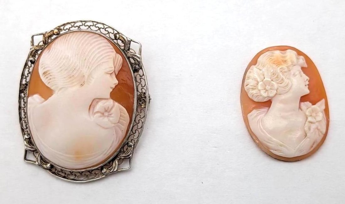 (2) Vintage Cameos: (1) 34mm x 26mm mounted in filigree sterling bezel & (1) 29.5mm x 21mm, loose