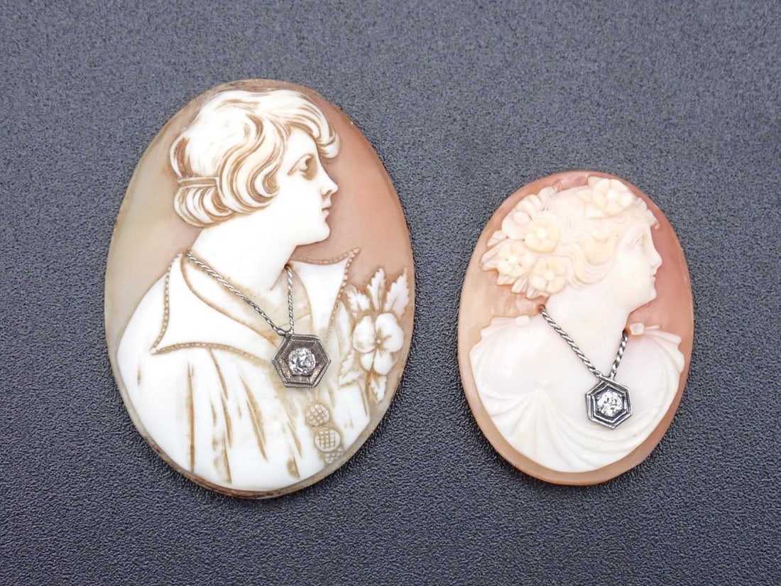 (2) Vintage Cameos: (1) 45mm x 34mm with diamond & (1) 34mm x 25mm with white sapphire