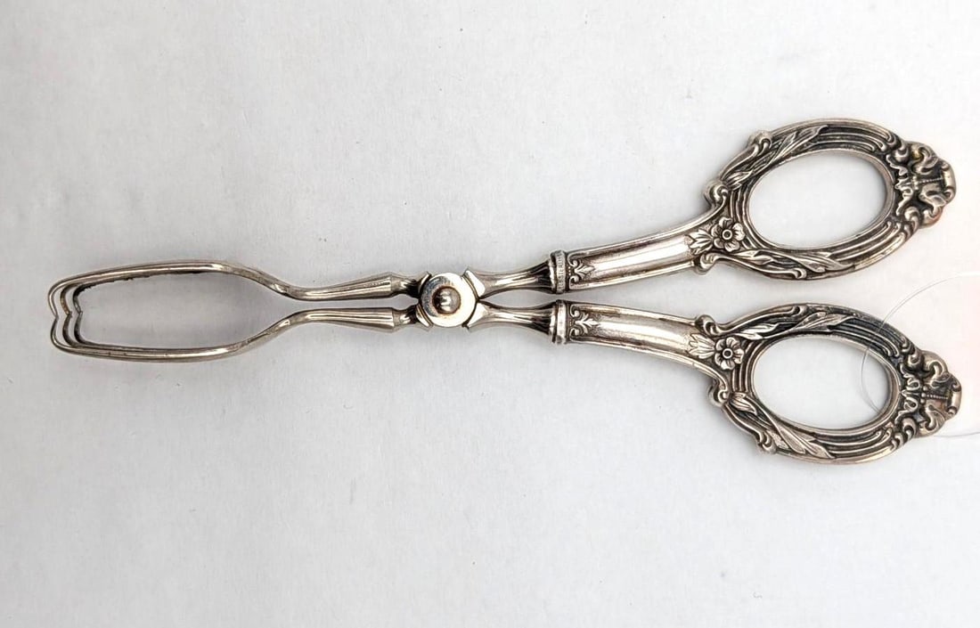 German Sterling Silver Handled Tongs: 7" in length, some corrosion to tongs