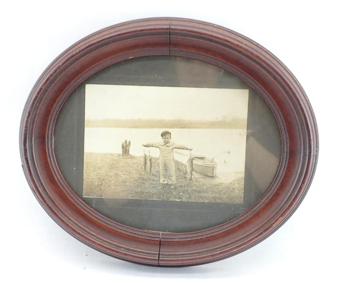 Antique Photograph of a Boy Holding Stringers of Trout: the image 4.875" x 6.75", in Victorian frame