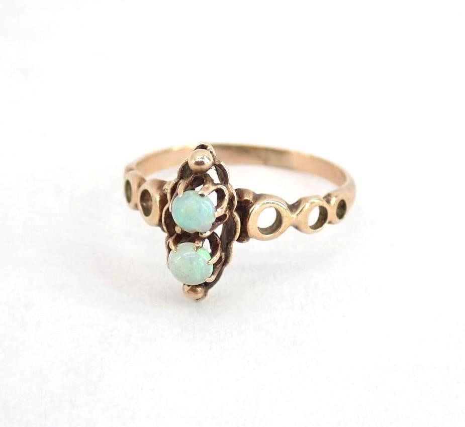 14K Rose Gold and Opal Victorian Ring: set with (2) fiery 3.4mm +/- opals, size 5.5, 1.53 grams total weight, acid tested