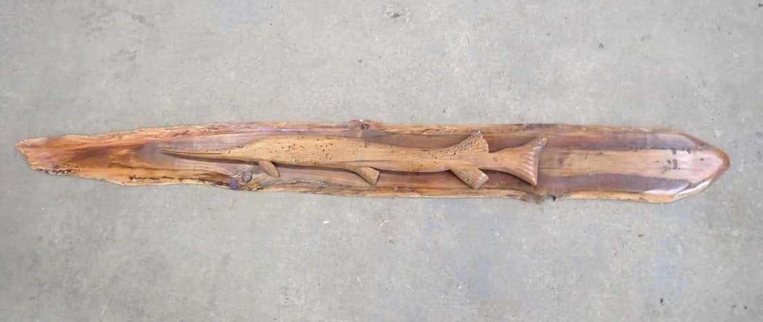 Folk Art Carved Wood Gar on wood slab: 73" overall length