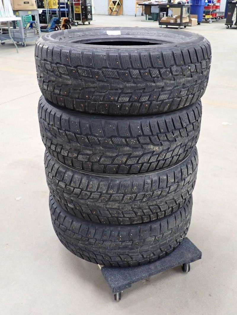 Set of (4) Cooper Evolution Winter Studded Snow Tires: 235/60R18