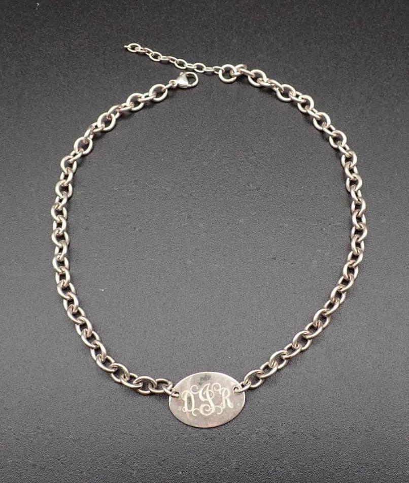 Sterling Silver Monogram Necklace: 16" - 18" in length, 33.94 grams