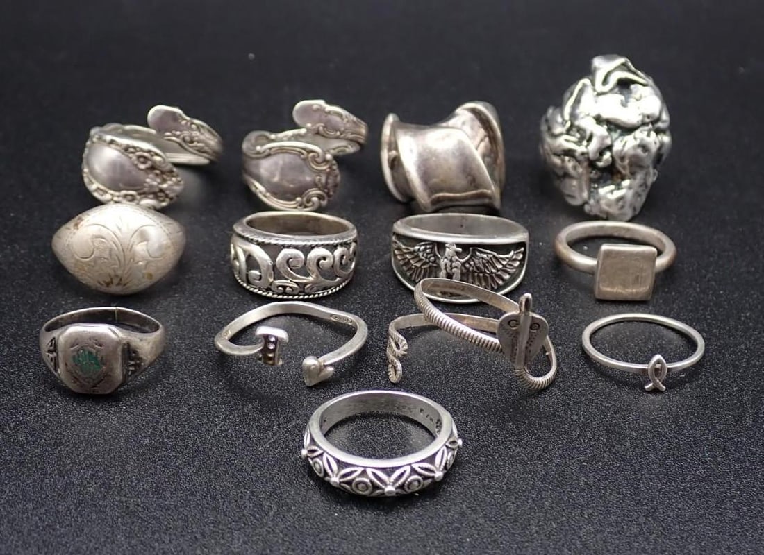 (12) Sterling Silver Rings: 105.4 grams total weight