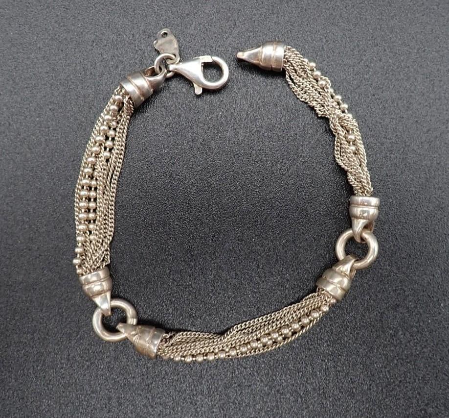 Stefani St. Jacques Sterling Silver Bracelet: 7.75" in length, 14.9 grams