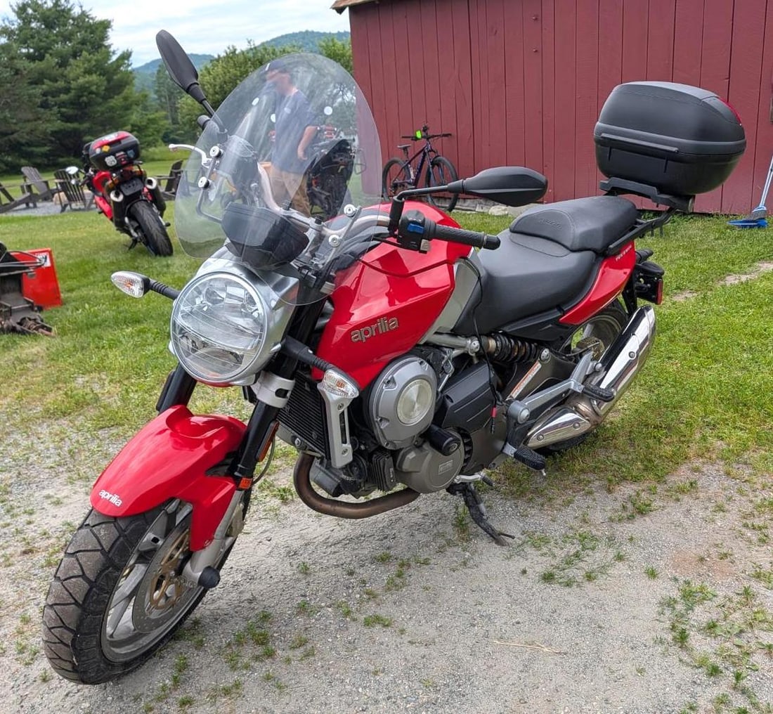 2009 Aprilia Mana 850 Motorcycle: VIN: 2D4RCO20898000270, ODO: 11983, Sport Gear System (CVT), chain driven, foot and Button shifter, gear mode, pop open tank storage, rear hard case, includes low profile windscreen, Location: Garage