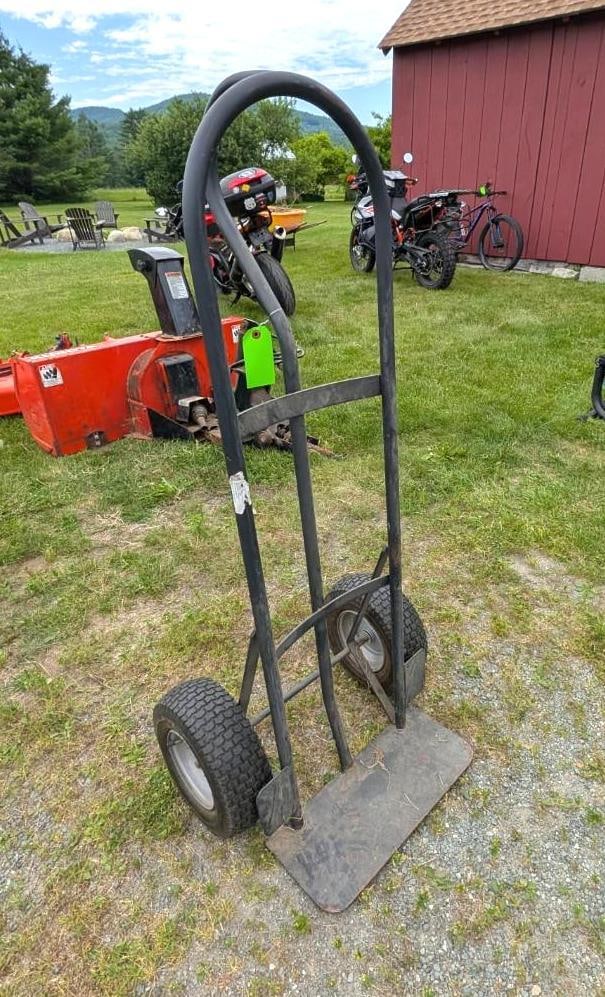 Pneumatic Tire Hand Truck: tires need air, Location: Garage
