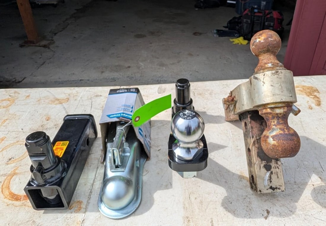 Trailer Hitch Lot: Including 2.5" Straight Coupler Fits 2" ball, (2) Stealth Hitches, Ect., Location: Garage