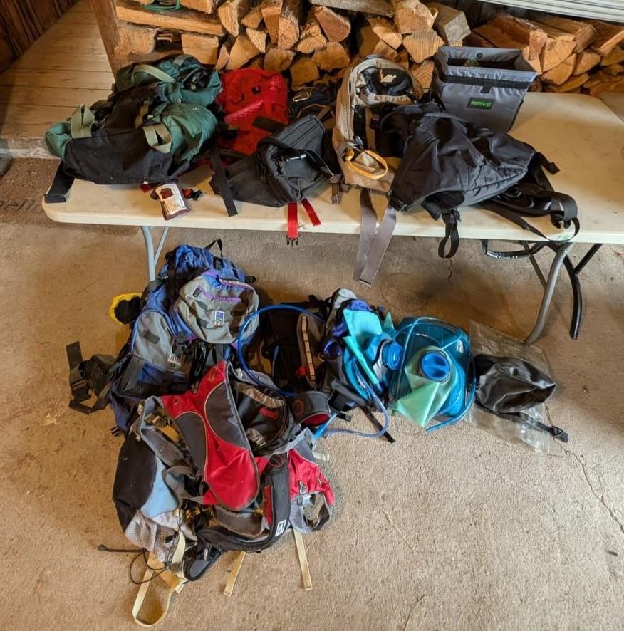(16+/-) Outdoor Backpacking/Hiking Backpacks: including: Camel Backs, water pouch inserts, backpacking bags, etc., Location: Garage