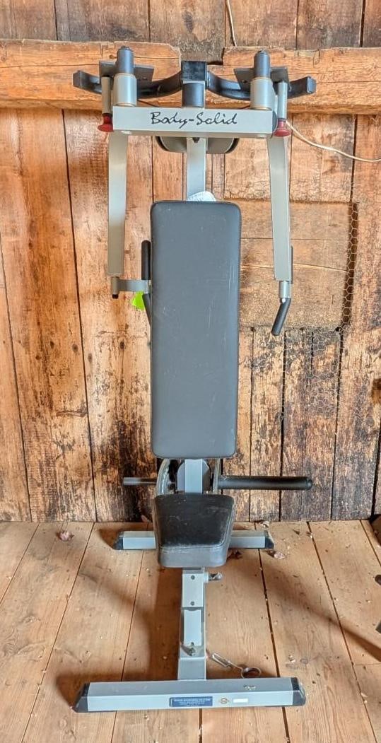 Body Solid GPM65 Plate Loaded Pec Machine: 32" x 25" x 66" **buyer responsible for removal**, Location: Barn