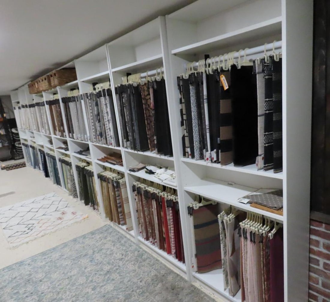 Large Assortment of Fabric & Carpet Samples on White Shelf Units (1 of 20)