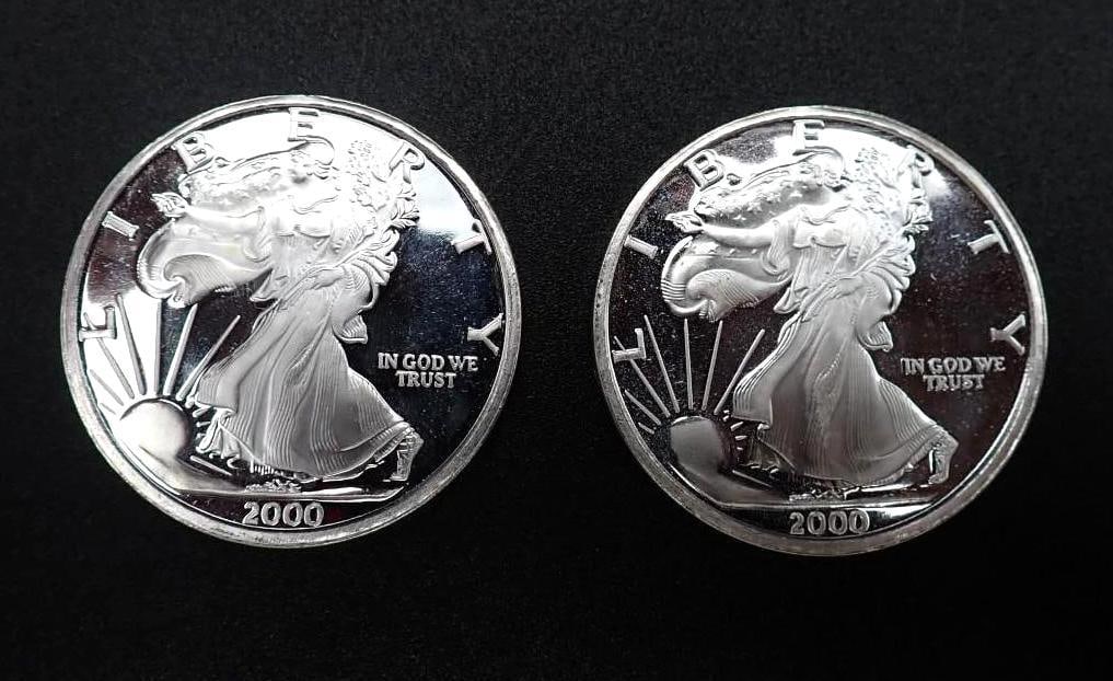 (2) 2000 "The Dawn of a New Millenium" 1 Ounce .999 Silver Rounds: (2) 2000 "The Dawn of a New Millenium" 1 Ounce .999 Silver Rounds -deep cameo proof strike