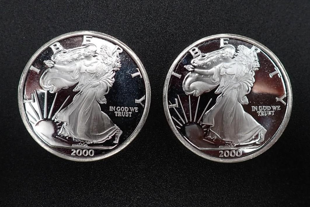 (2) 2000 "The Dawn of a New Millenium" 1 Ounce .999 Silver Rounds: (2) 2000 "The Dawn of a New Millenium" 1 Ounce .999 Silver Rounds -deep cameo proof strike