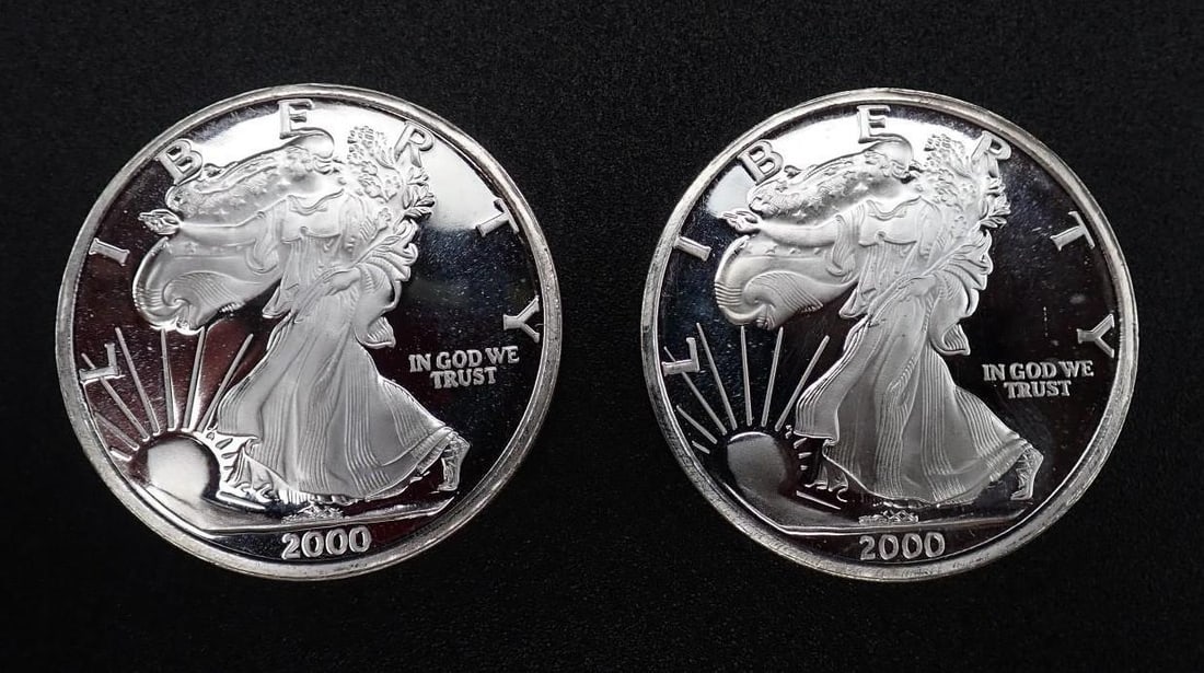 (2) 2000 "The Dawn of a New Millenium" 1 Ounce .999 Silver Rounds: (2) 2000 "The Dawn of a New Millenium" 1 Ounce .999 Silver Rounds -deep cameo proof strike