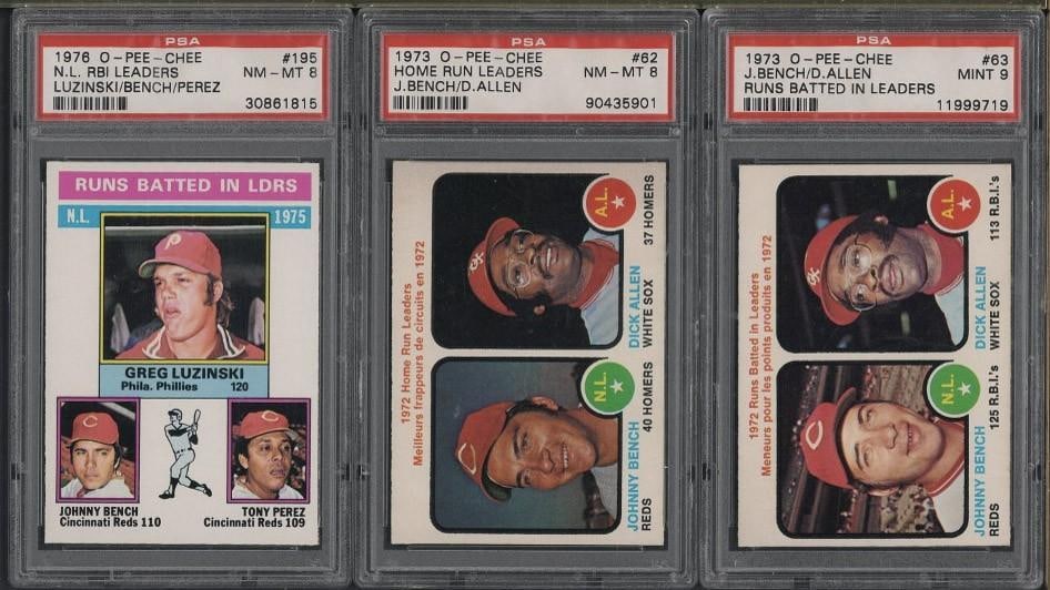 (3) O-Pee-Chee 1973 & 1976 Cards: (3) O-Pee-Chee 1973 & 1976 Cards -1973 #63 J. Bench / D. Allen RBI Leaders, PSA Mint 9 & #62 Home Run Leaders J. Bench / D. Allen, PSA NM-MT8; 1976 #195 N.L. RBI Leaders, PSA NM-MT 8