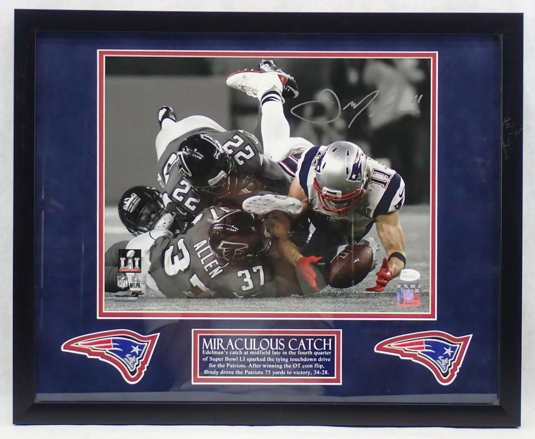 Julian Edelman Autographed Photograph "Miraculous Catch": Julian Edelman Autographed Photograph "Miraculous Catch" -JSA witnessed and certified, 17.375" x 21.375" framed