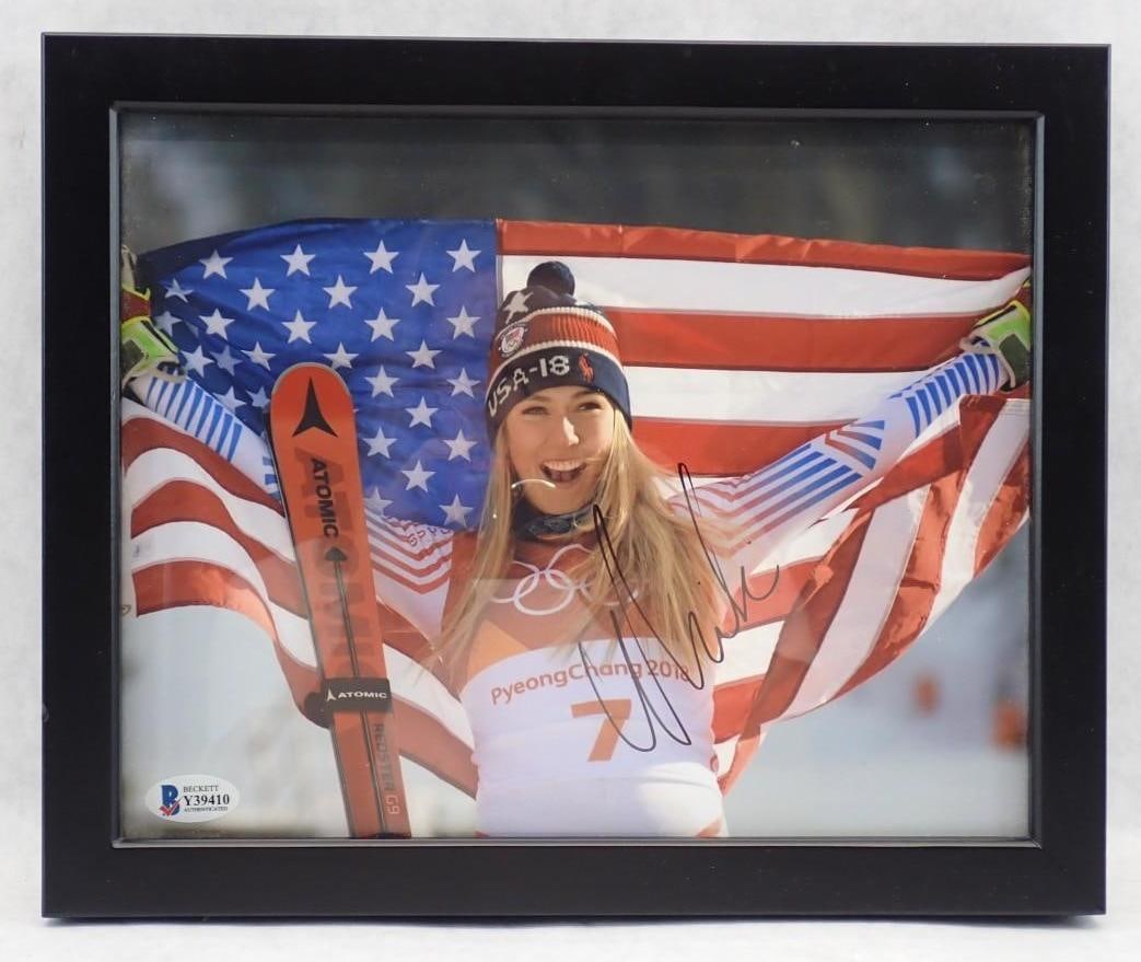 Mikaela Shiffrin Autographed Color Photograph: Mikaela Shiffrin Autographed Color Photograph -Beckett certification sticker affixed, 9" x 11" framed
