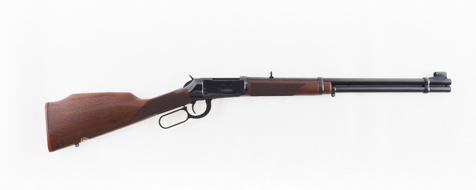 Winchester 94AE XTR Rifle: SN: AE15244 Cal: .307 Winchester Action Type: Lever Action Barrel Length: 20" Sights/Optics: adjustable rear sight Stock: checkered walnut, a very small blemish on the forend checkering Finish: blue